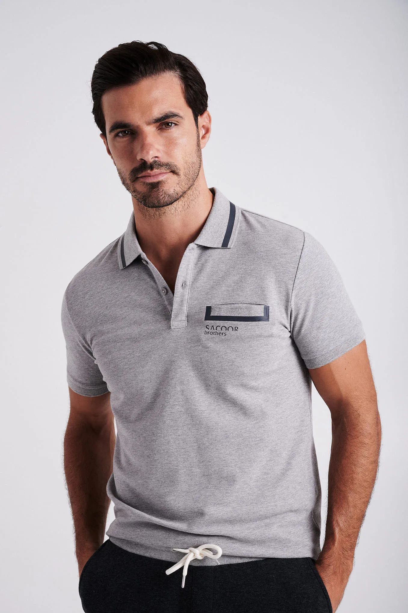 Men's cotton piquet polo with adhesive tape on chest pocket