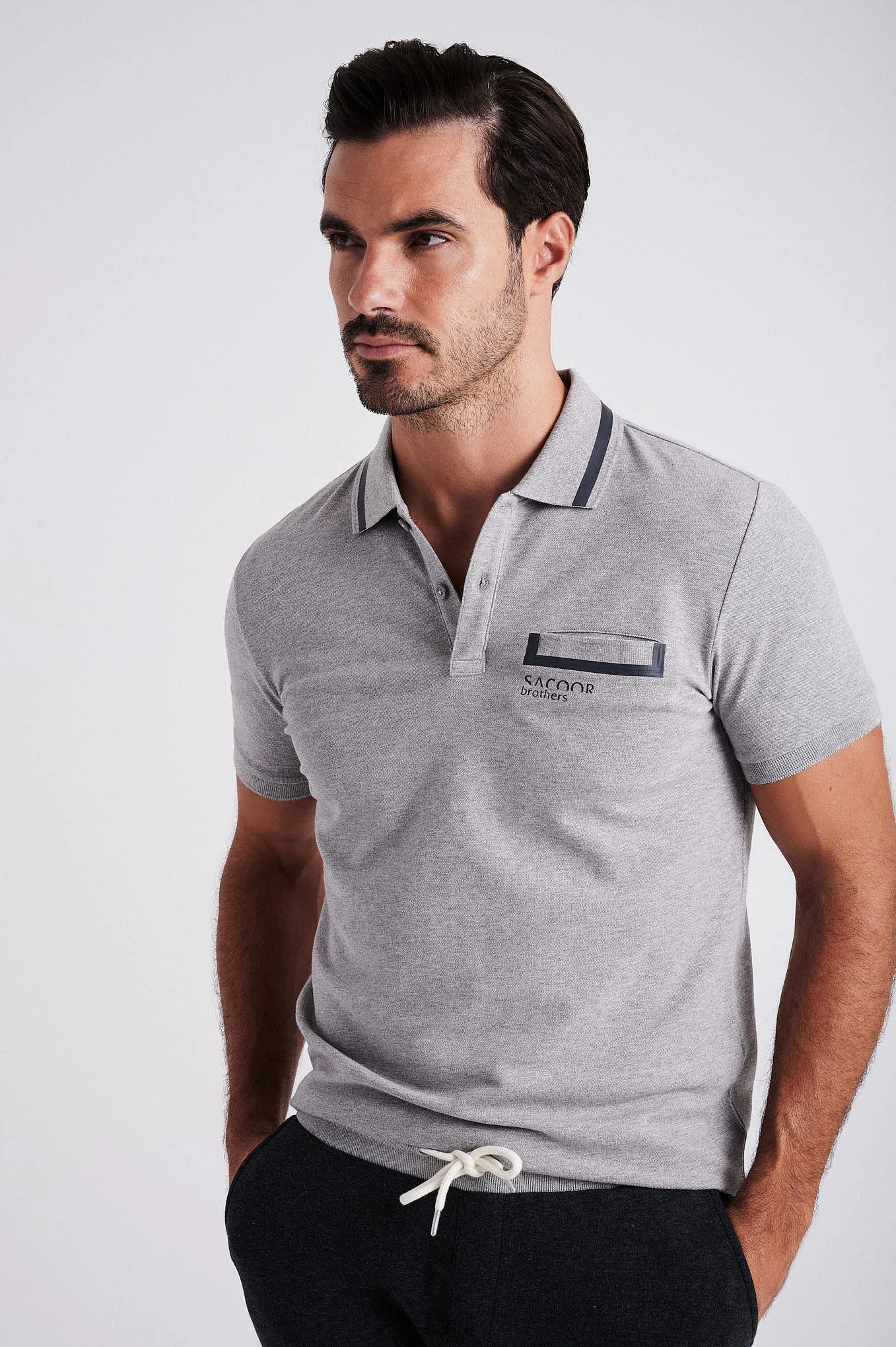 Men's cotton piquet polo with adhesive tape on chest pocket