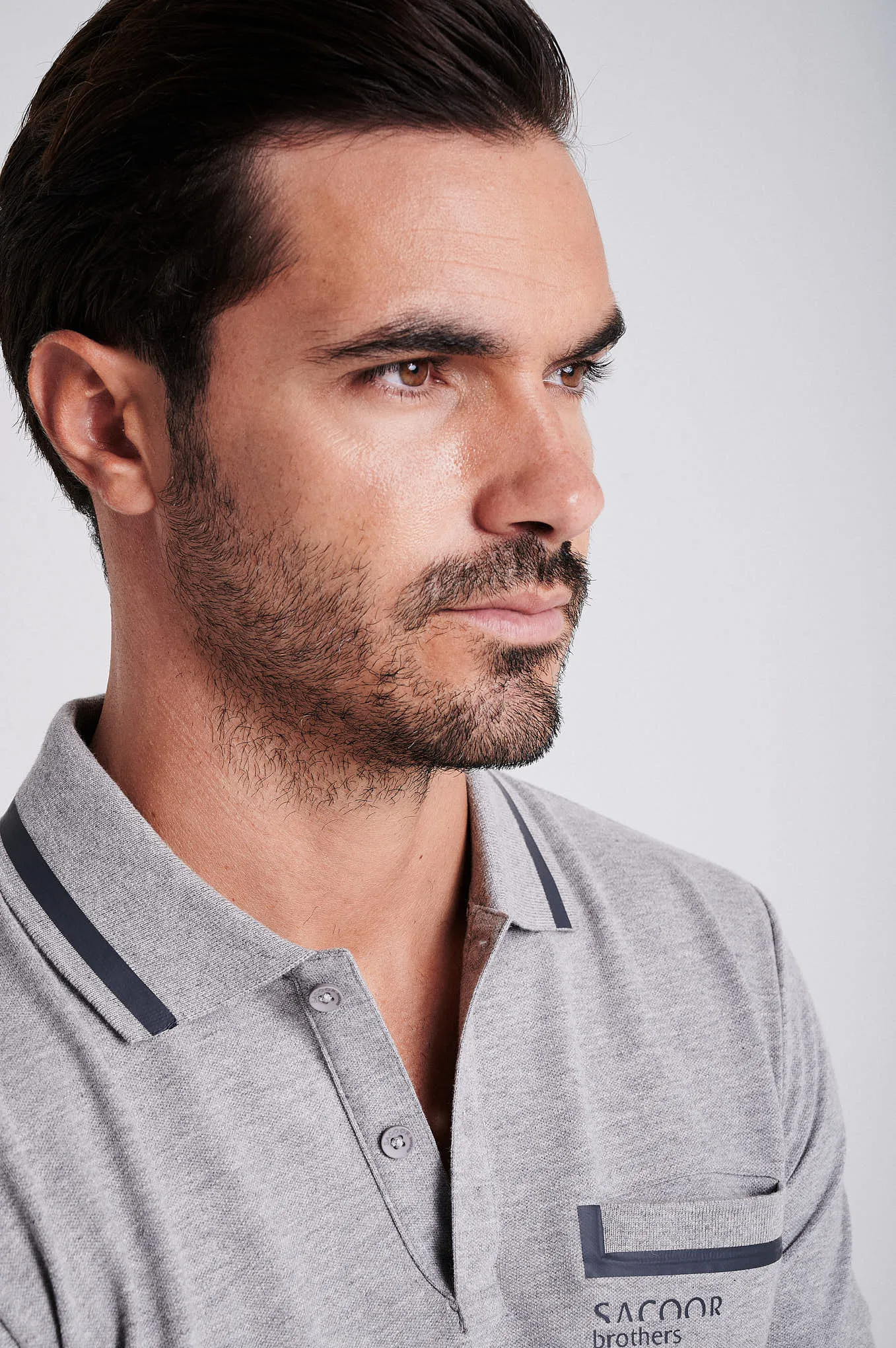 Men's cotton piquet polo with adhesive tape on chest pocket