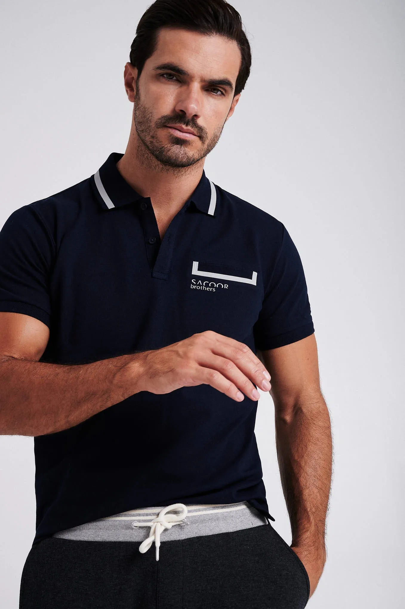 Men's cotton piquet polo with adhesive tape on chest pocket