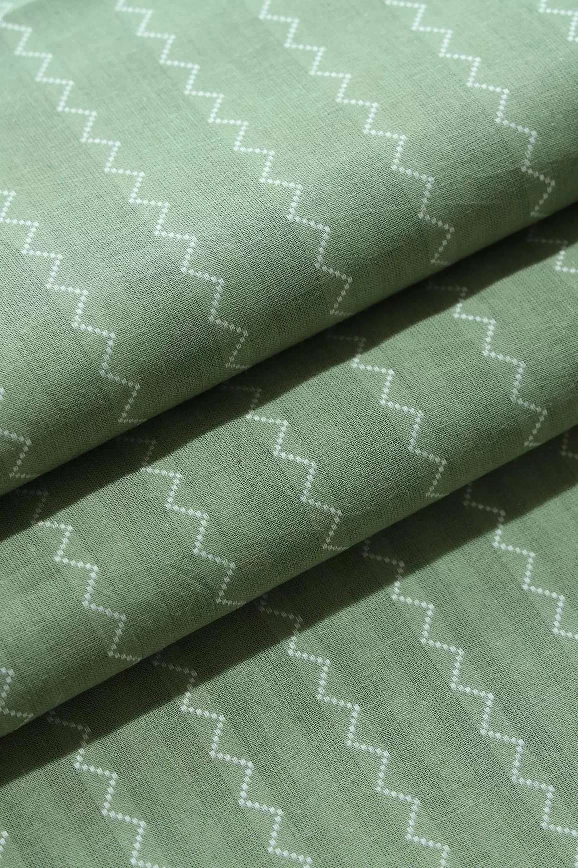 Olive And White Chevron Pattern On Handwoven Organic Cotton Fabric