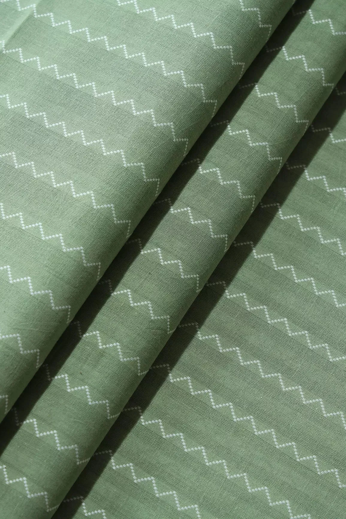 Olive And White Chevron Pattern On Handwoven Organic Cotton Fabric